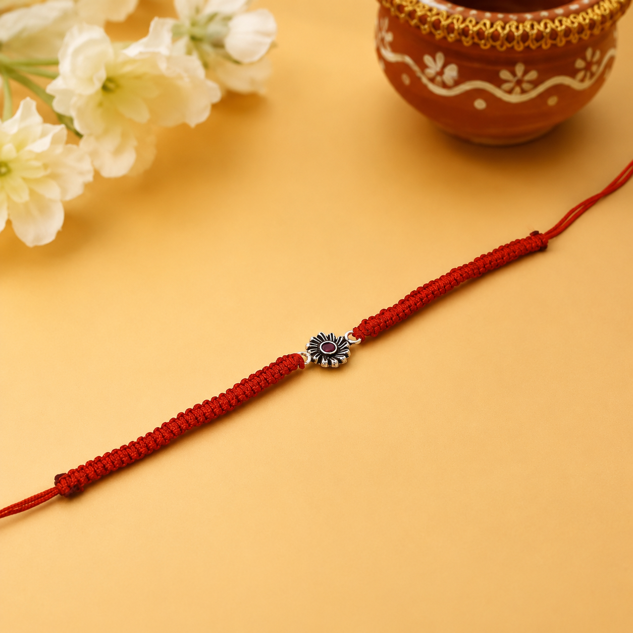 Red Thread Floral Silver Rakhi – OYA by Gemkara view 2